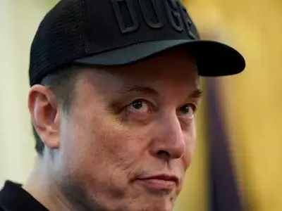 Tesla Faces Headwinds as Musk Warns of Challenging Quarters Ahead