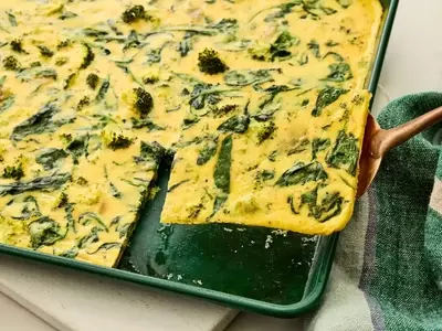 Crowd-Pleasing Spinach, Broccoli, and Parmesan Quiche