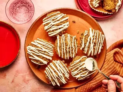 Delectable Gingerbread Muffins with Streusel Topping and Cream Cheese Glaze