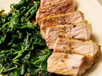 Quick One-Pan Garlic-Butter Pork Chops with Sautéed Spinach