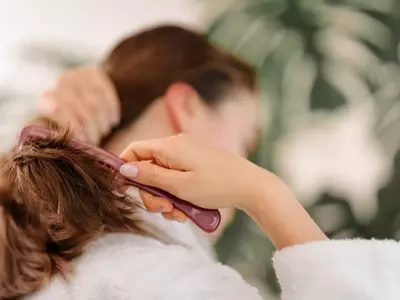 Understanding Postpartum Hair Loss: Causes, Management, and When to Seek Help