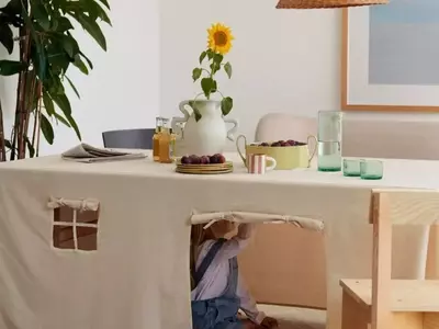 Crafting Whimsical Worlds: The DIY Tablecloth Playhouse