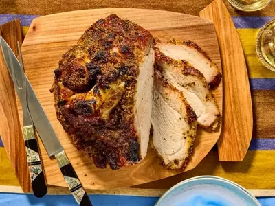Mastering the Art of Slow-Roasted Fresh Ham with Maple-Bourbon Glaze