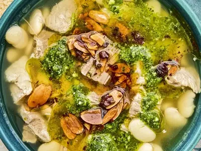 Mexican Brothy Beans with Pork, Salsa Macha, and Cilantro Pesto