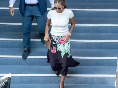 Michelle Obama Redefines Professional Attire with Chic Slip Skirt Ensemble