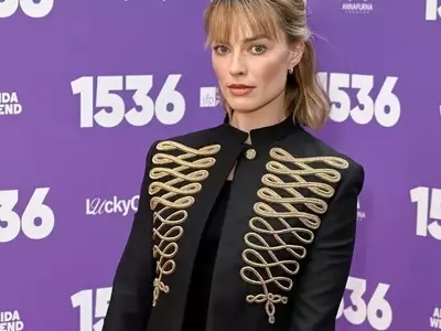 Margot Robbie's Striking Military-Inspired Look at West End Premiere