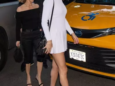 Taylor Swift Embraces Bridal White in a Chic Mini Dress for NYC Outing