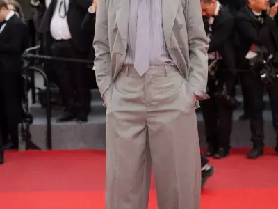 Renate Reinsve Borrows Stellan Skarsgård's Suit, Sparking a New Cannes Trend