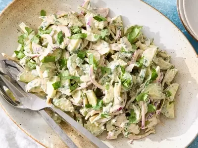 Refreshing Cucumber Salad with Spicy Yogurt Dressing: A Culinary Journey from Childhood Snacks