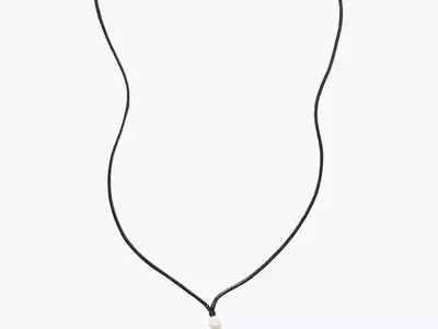 The Enduring Allure of the Cord Pendant Necklace: A Timeless Summer Essential