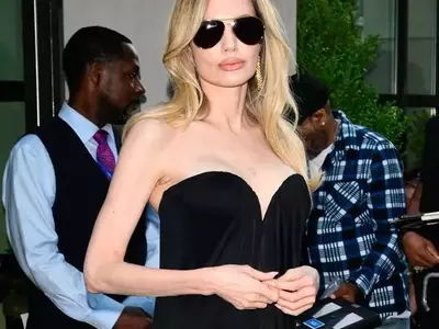 Angelina Jolie Shines in Black Gown at 'Couture' Screening