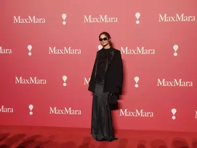 Katie Holmes Embraces 'Summer Goth' Look at Max Mara Show