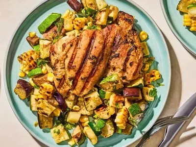 Flavorful Herb-Marinated Chicken Thighs with Grilled Vegetable Medley