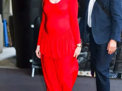 Anne Hathaway's Bold Maternity Style Debut in Red