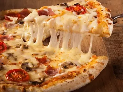 Domino's Pizza Exceeds Revenue Estimates Despite Earnings Miss in Q2