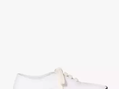 The Resurgence of White Canvas Sneakers: A Summer Styling Guide