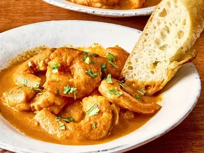 A Culinary Exploration of Shrimp and Chorizo in a Velvety Tomato Sauce