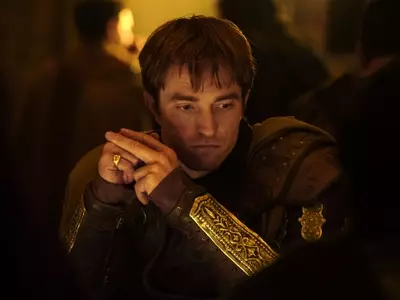 “The Odyssey” surpasses “The Dark Knight” in box office success, sparking debate over its status as a Christopher Nolan masterpiece