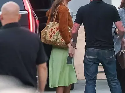 Dakota Johnson's Modern 70s Concert Style