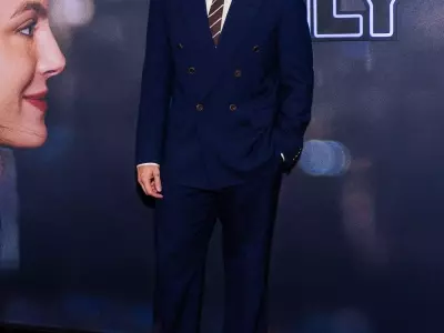 Callum Turner's Stylish Twist on the Classic Navy Suit