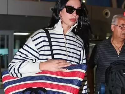 Dua Lipa Redefines Airport Chic with Oversized Chanel Tote